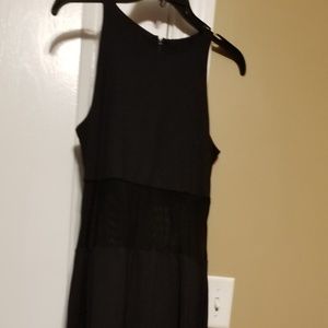 All black dress with a sheer panel